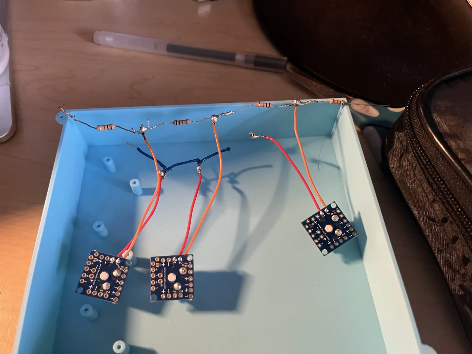 Early free-form resistor-ladder wiring with exposed solder joints